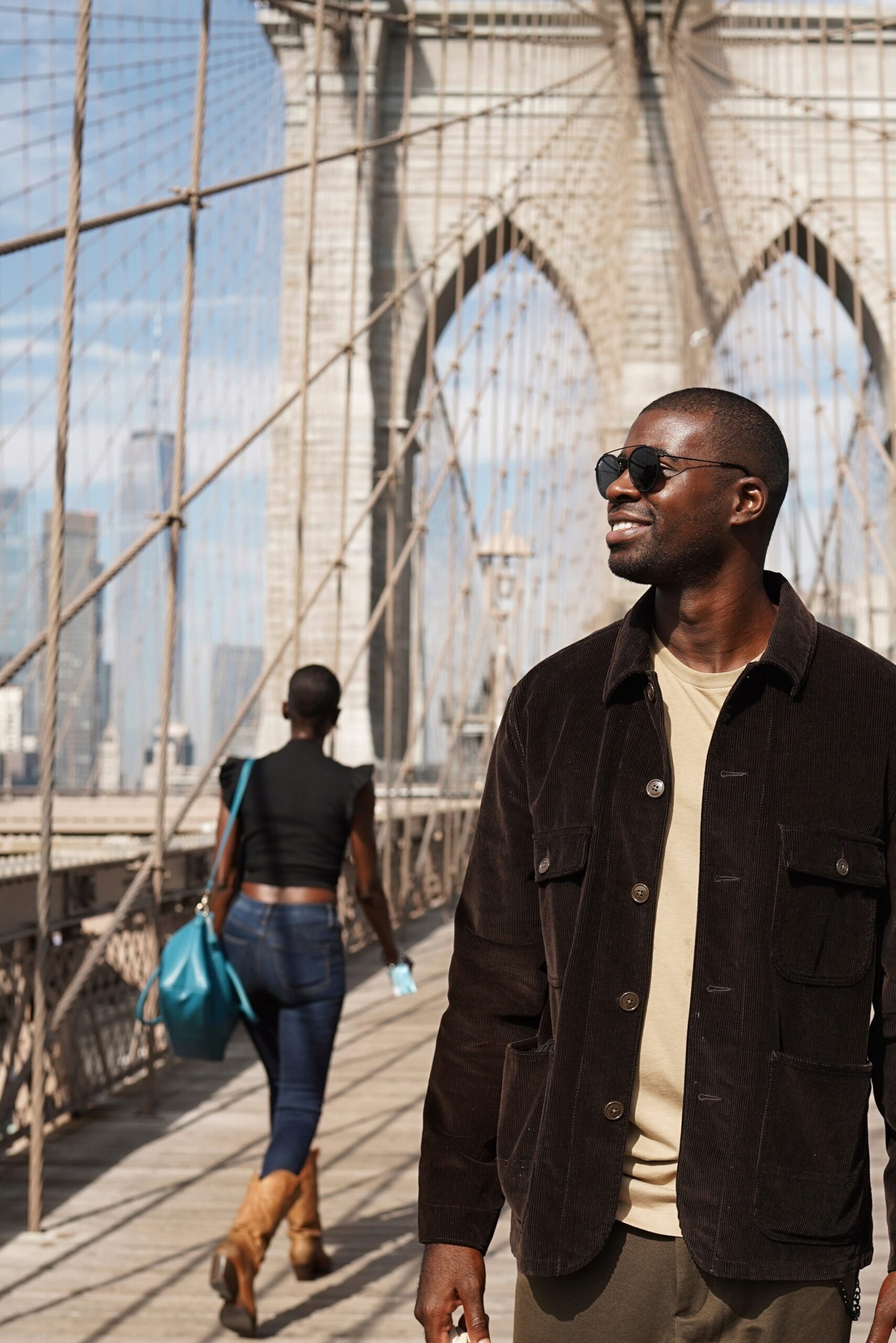 young-stylish-man-exploring-city-bridge-by-himself (1)